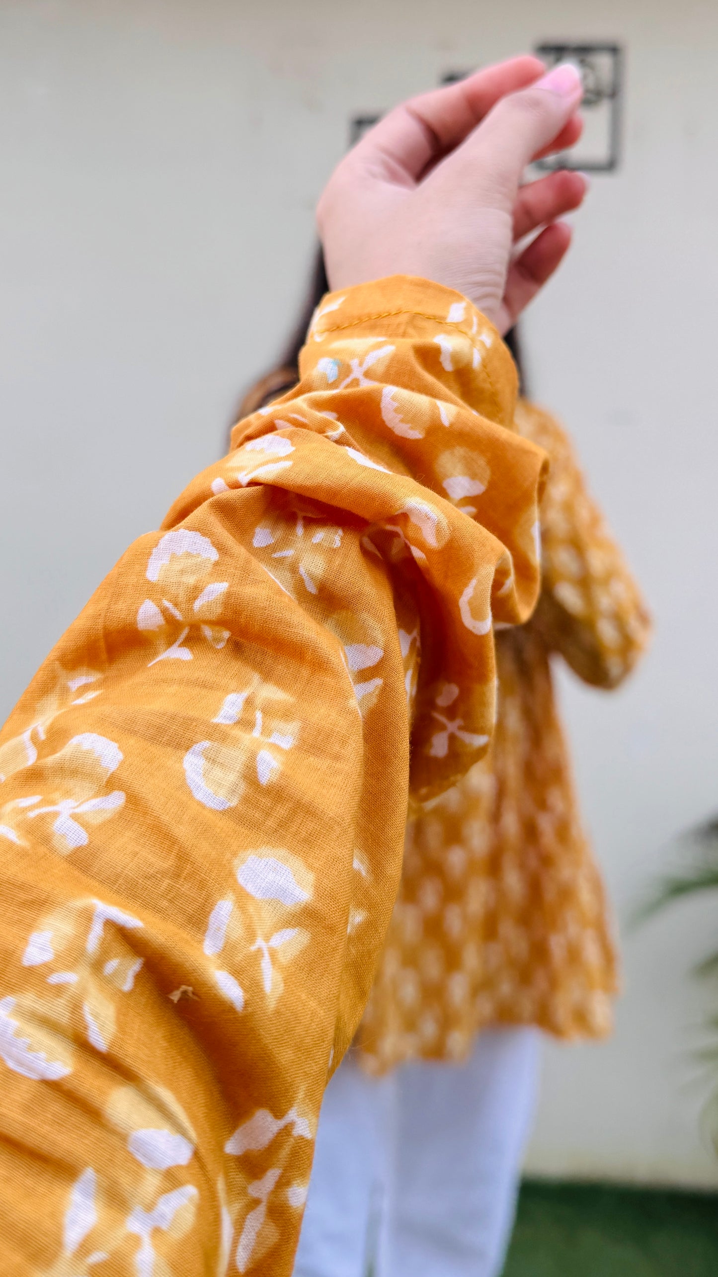 Cotton Yellow Flared Printed Aliacut Peplum Top